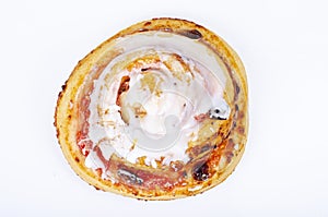 Sweet bun with raisins and white sugar icing. Studio Photo.