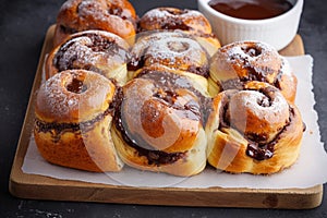 Sweet bun rolls baked to perfection, oozing with chocolate filling