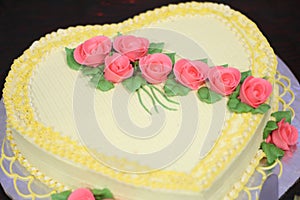 Sweet cake decorated with rose flowers