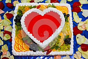 Tasty Cake - Jelly heart with fresh fruits, mint and berries colorful, close up with copy space