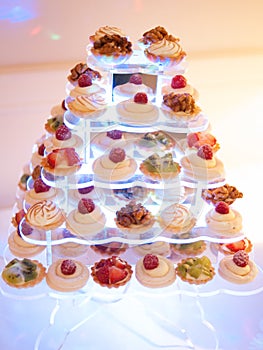 Sweet candy bar.Different delicious cake and fruits. photo