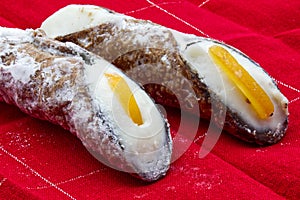 Sweet Cannolo Siciliano. Traditional south Italian dessert. Delicious Sicilian Cannolo filled with ricotta cheese