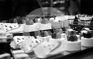 Sweet Celebration: An Exhibit of Pastries, Croissants, Macarons, and Muffins at the Bar Counter - Greetings from the Tempting