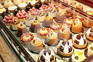 Sweet Celebration: An Exhibit of Pastries, Croissants, Macarons, and Muffins at the Bar Counter - Greetings from the Tempting