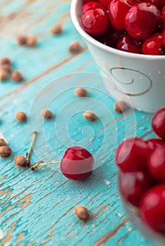 Sweet Cherry in Bowl on Rustic Table