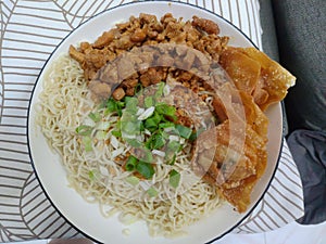 Sweet Chicken noodles with fried dumplings