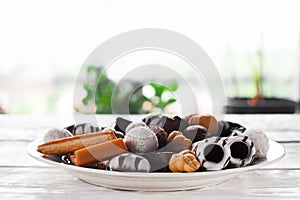 Sweet chocolate candies on table side view