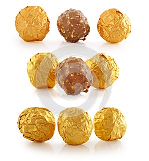 Sweet chocolate candy wrapped in golden foil