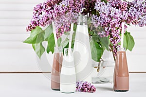 Sweet chocolate milkshakes and beautiful lilac flowers