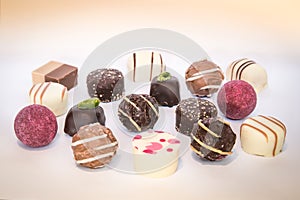 Sweet Chocolate mini pralines isolated on white background.