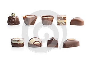 Sweet chocolate pralines. Tasty chocolate truffles isolated on white background