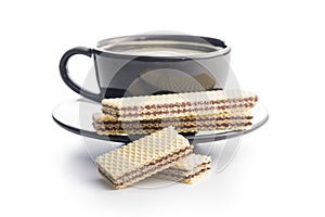 Sweet chocolate wafer and coffee cup isolated on white background