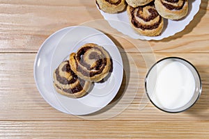 Sweet cinnamon rolls with milk