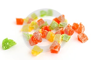 Sweet colorful candied fruit on a white background