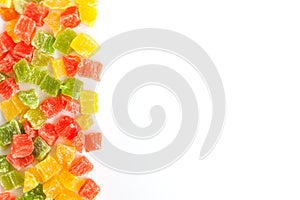 Sweet colorful candied fruit on a white background