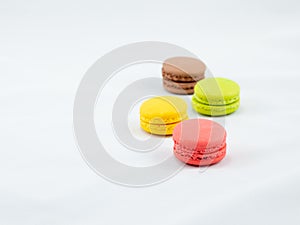 Sweet and Colorful four macaroons lying togehter