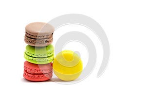 Sweet and Colorful four macaroons stacked togehter on white
