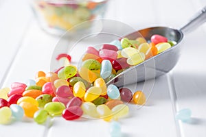 Sweet colorful jelly beans in scoop