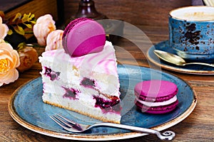 Sweet and Colourful Cake with French Macaroons with Cup of Cofee