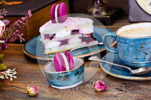 Sweet and Colourful Cake with French Macaroons with Cup of Cofee