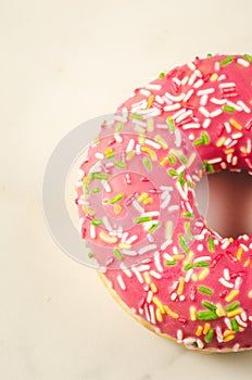 Sweet and colourful pink doughnut/Sweet and colourful pink doughnut on a background