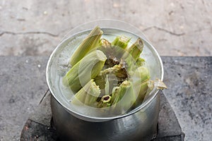 Sweet corn boil with salt. cooked sweet corn in pot