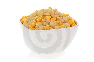 Sweet corn in a bowl isolated on white