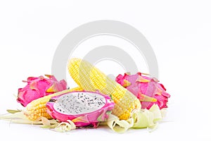 sweet corn cobs kernels and dragon fruit pitaya on white background fruit and vegetable isolated food