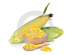 Sweet corn in wooden bowl and spoon with fresh corn isolated