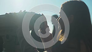 Sweet couple enjoying aerial city panorama looking to tower viewer on skydeck