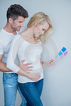 Sweet Couple Looking at Color Indicator Paper