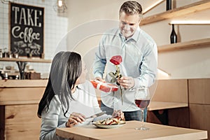 Sweet couple meeting at cafe