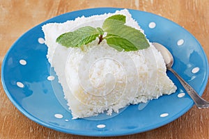 Sweet couscous (tapioca) pudding (cuscuz doce) with coconut