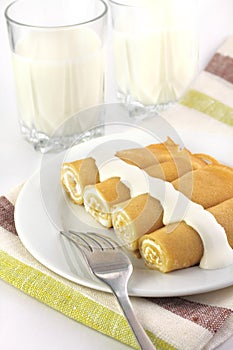 Sweet crepes stuffed with cottage cheese