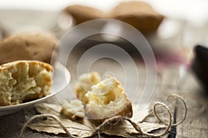 Sweet cupcakes on old wooden background