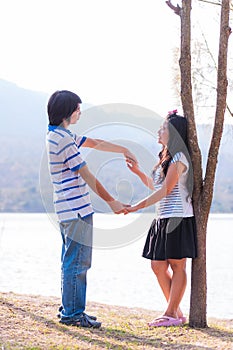 Sweet Cute Couple Relaxing in Park