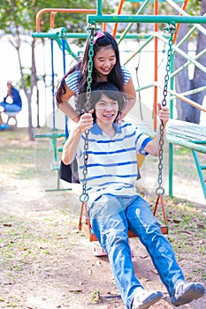 Sweet Cute Couple Relaxing in Park