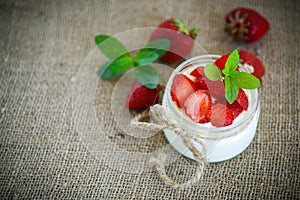 Sweet delicious yogurt with fresh strawberries