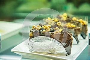Sweet Dessert: Chocolate chip snack cake with nuts toppings
