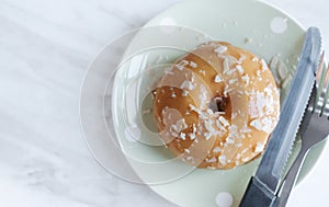 Sweet donut on the table with textspace photo
