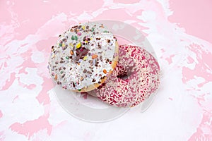 Sweet donut on a white and pink background