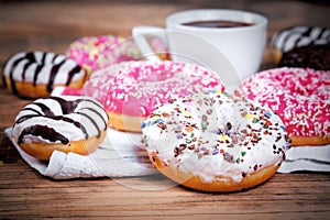 Sweet donuts, American donut and cup of coffee