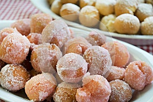 Sweet dough balls with alchermes liqueur called castagnole