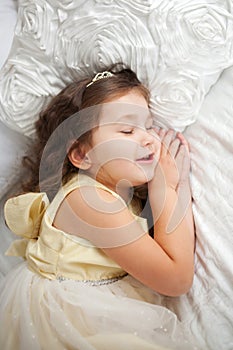 Sweet dreams. Happy smiling kid sleeping