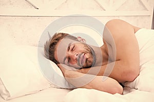 Sweet dreams. Health care concept. Circadian rhythm regulates sleep wake cycle. Man handsome unshaven guy in bed. Enough photo