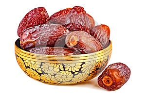 Sweet dried dates in oriental cup photo