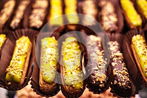 Sweet eclairs with icing close-up