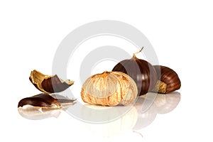 Sweet edible chestnuts isolated on white background