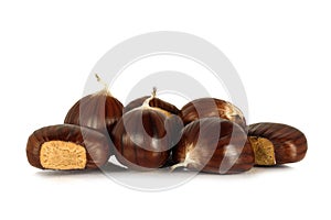 Sweet edible chestnuts isolated on white background