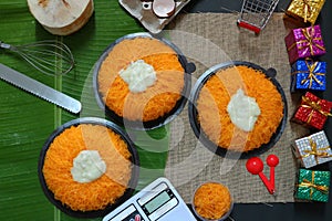 Sweet egg, cake line or fios de ovos, sweet cream cake, coconut, egg, banana leaf, flour pastry for the New Year festival top view